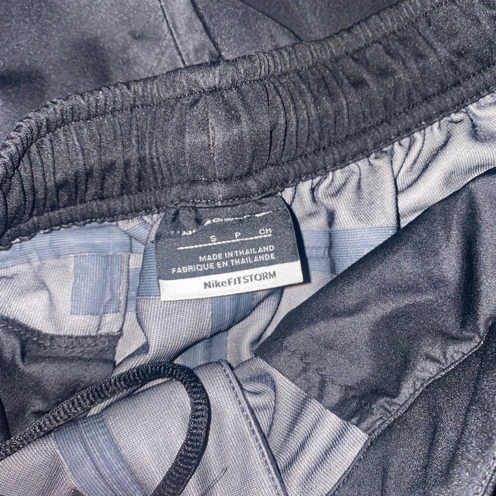 Nike golf rain pants “storm fit”